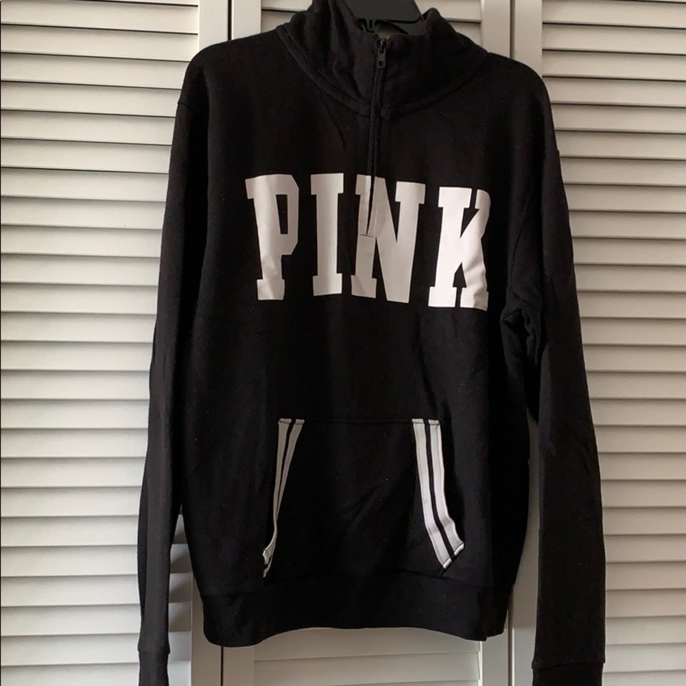Pink sweater.